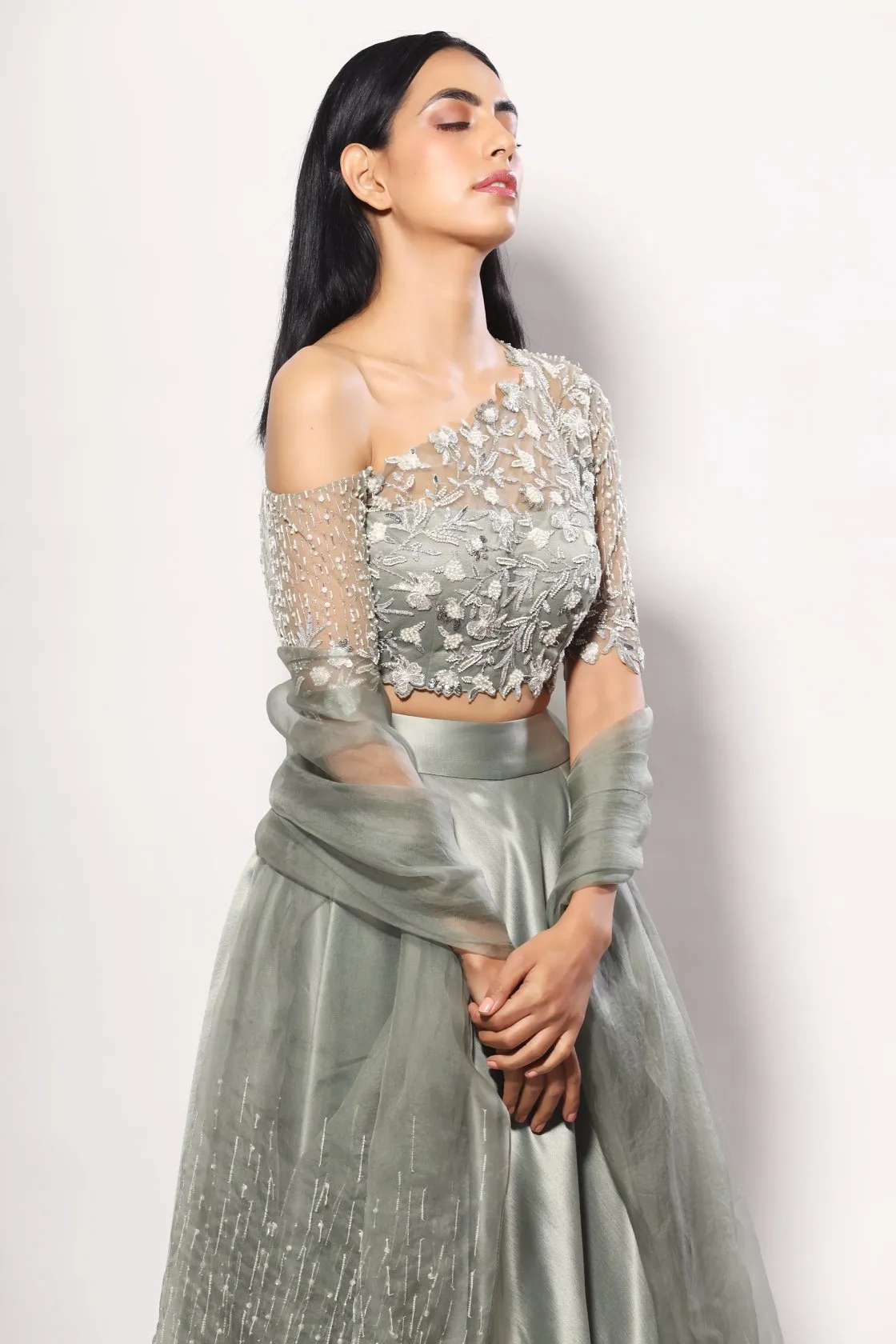 Olive one-off shoulder heavy embelished blouse lehenga set