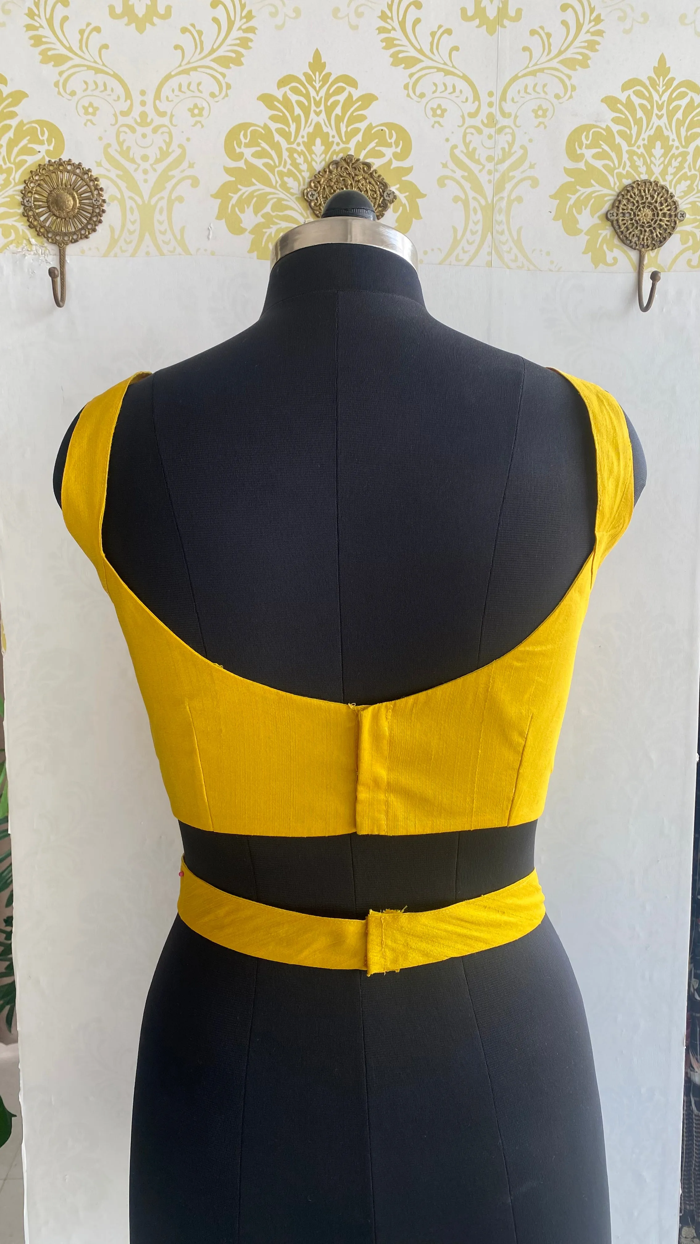 Yellow silk waist band patterned blouse